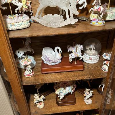 Collection Of Porcelain Carousel Horses And Humming Birds 