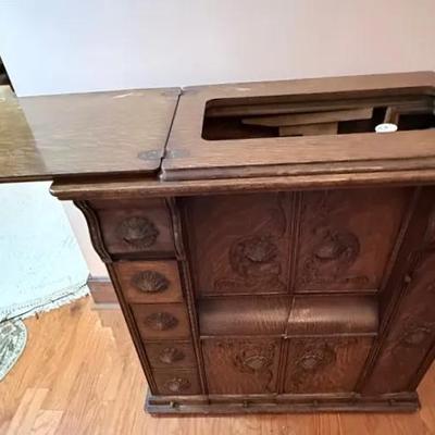Antique Singer Treadle Sewing Machine In Oak Cabinet