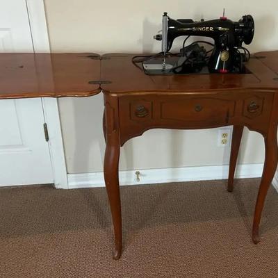 Singer Sewing Machine And A Bird Cage