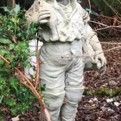Boy Holding Fish Statue
