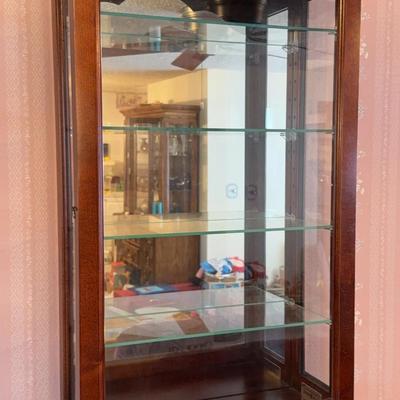 Howard Miller Mahogany Curio Cabinet