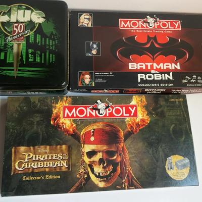 3 GAMES NIB - Clue Special Edition, Monopoly Batman And Pirates Of The Caribbean Board Game