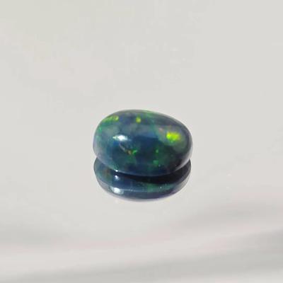 1.9ct Natural Enhanced Rainbow Luster Oval Black Opal