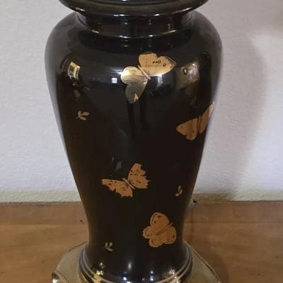 Two ceramic butterfly lamps with brass bases