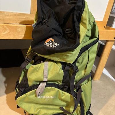 lime green and black Lowe Alpine hiking backpack
