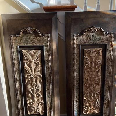 Two Tall Pieces Of Art