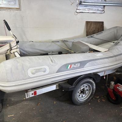 Great dinghy with 15 horse aluminum trailer ready to float