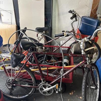 Bicycles wagons, lots of garage stuff, large diggers garage behind house with heat 