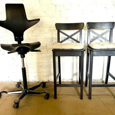 A HAG Modern Task Stool With Two Wooden Counter Stools