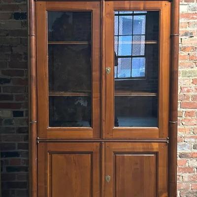 An Austrian Biedermeier Style Walnut and Oak Glass-Front China Cabinet