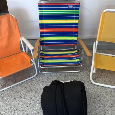 Three Folding Chairs And Sleeping Bag