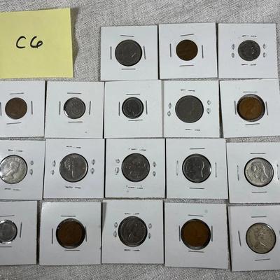 Lot Of Various Foreign Coins In Sleeves