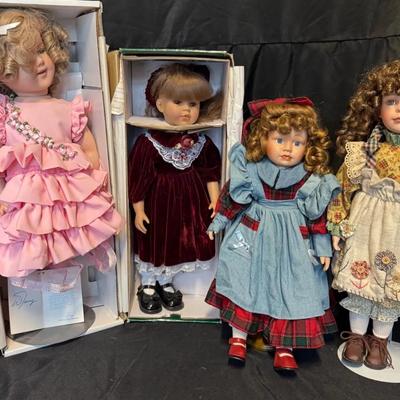 RJ512 - Vintage Porcelain dolls in original clothing. Approximate measures 19 - 24" tall.