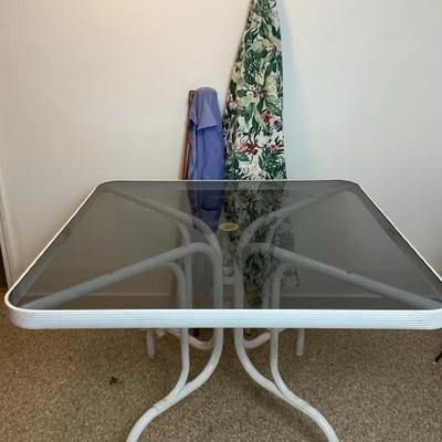 Outdoor Glass-Top Patio Table with Umbrellas