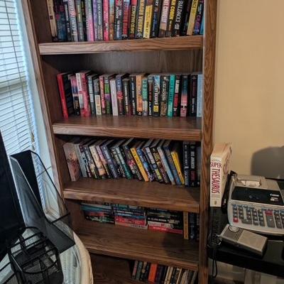 Pair of matching bookcases and broad selection of books,