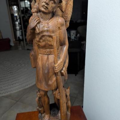 South American Carving, hikeing man with dog. 30" +/- tall