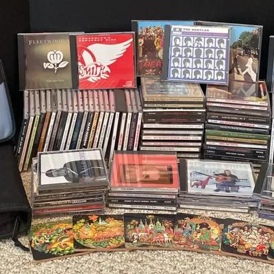 Collection of Music CDs Featuring The Beatles, Sting, Nat King Cole & More