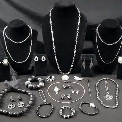 Silver Tone And Black Jewelry Featuring Fossil 