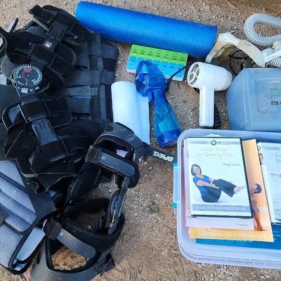 Collection Of Health Items - Knee Braces, Yoga DVDs & Books, Pill Organizer, Mister Fan & More