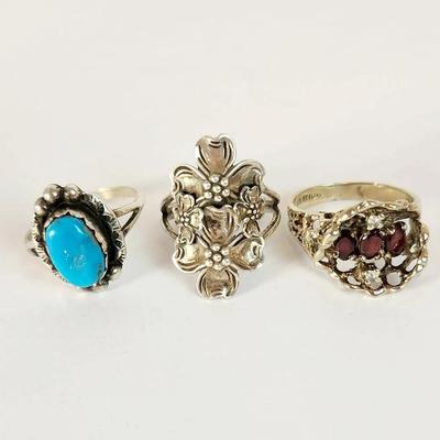 Lot of Three Vintage Sterling Silver Rings: Turquoise, Dogwood Flower, and Garnet Look