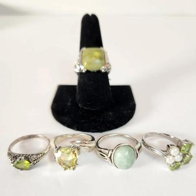 Collection of Five Sterling Silver Green Gemstone Rings