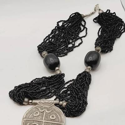 Tribal Style Pendant Necklace with Metal Glass and Horn Beads 