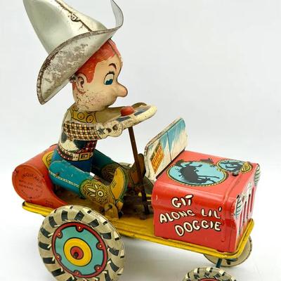 Unique Art Mfg. Co. tin lithographed wind-up "Rodeo Joe" toy