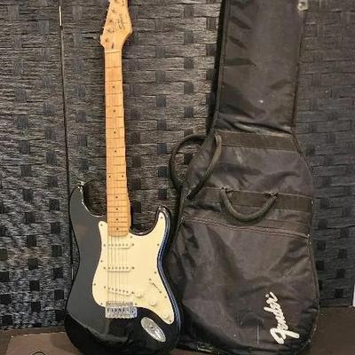 Squier Stratocaster Electric Guitar by Fender, Tuner & Fender Guitar Bag