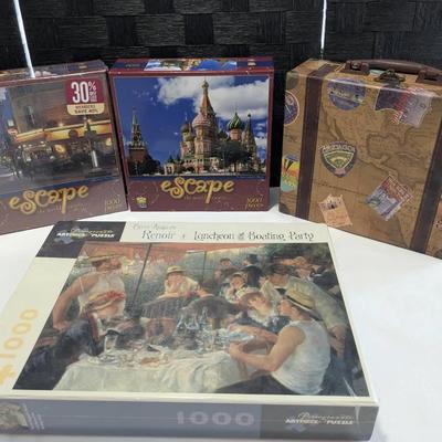 (2) Scape The World Awaits 1000 Pieces Puzzle ,Renoir Puzzle & Suitcase Box 