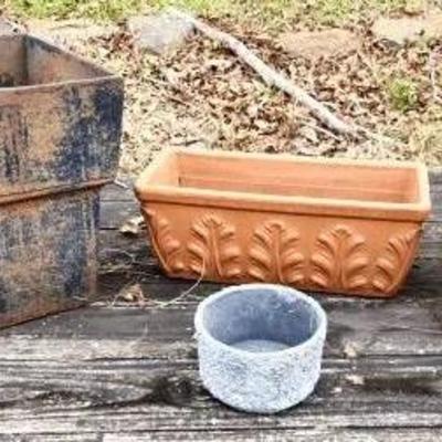 Cast Iron and Clay Planter Pots