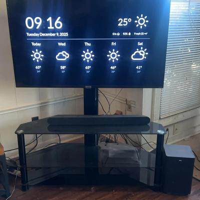 43” TCL TV with Stand, 30” Sound Bar, and 8” x 8” Speaker