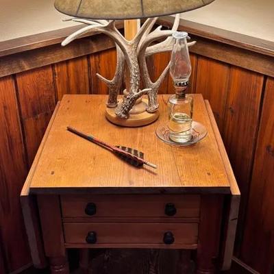 Wooden Two Drawer Drop Leaf Side Table W/ Antler Lamp, Kerosene Lamp & Arrow