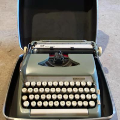 Smith-Corona Typewriter with Built in Case  
