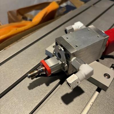 Positive Displacement Dispensing Valve On Workbench