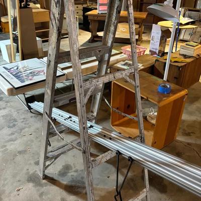 A Frame Ladder And Extendable Storage Rack