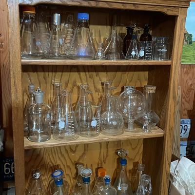 Bookshelf with Glass and Pyrex Scientific Equipment 