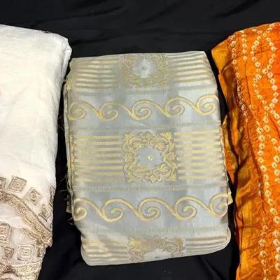 Lot 135:  Yards And Yards of Crushed Voile and Damask Fabric and Piece of Batik