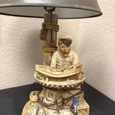 Lot 120:   Vintage Nautical Fisherman Table Lamp – Sea Captain Figurine with Boat & Dock Details