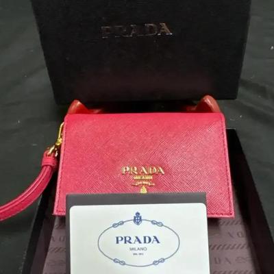 Lot 156:  Authentic Prada Saffiano Leather Wristlet Card Holder – Red with Box & Auth Card