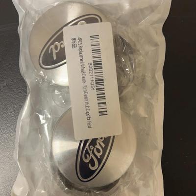 Lot 307: Replacement Ford Center Hubcaps