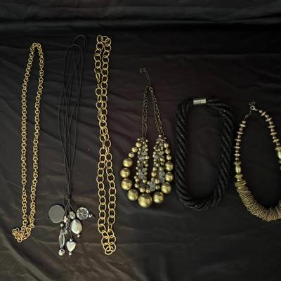 224: Lot of Fashion Statement Necklaces – Gold, Black, and Mixed Metal Designs