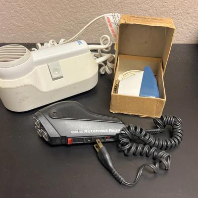 Lot 322: Vintage Grooming Electronics Lot – Norelco Razors + Wall-Mount Hair Dryer  Lot includes thr