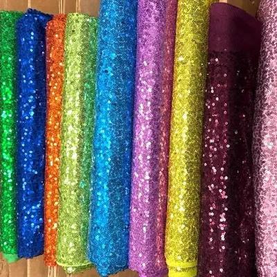 Lot 144:  Let Your Creativity Flow…14 Bolts Of Sequined Fabric
