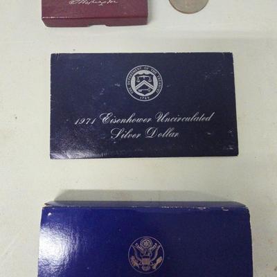 Set of Four Coins: Silver Dollars (Circulated & Uncirculated) and Half-Dollar