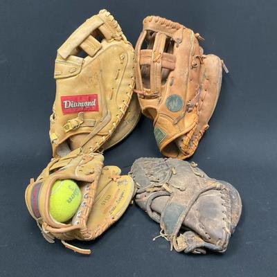 A Variety Of Vintage Baseball Gloves