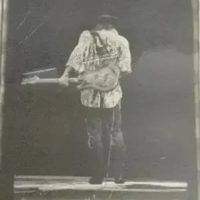 Framed Photo of Stevie Ray Vaughn On Stage (Size 25" X 19")