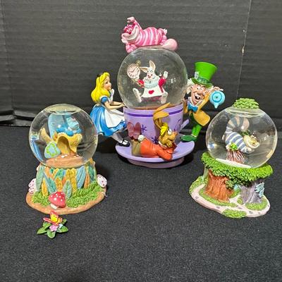 Three Alice In Wonderland Small Snow Globes