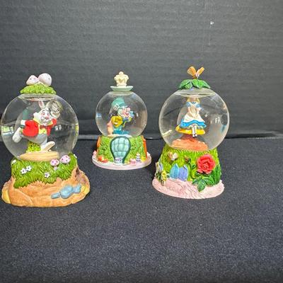 Three Disney Alice In Wonderland Small Snow Globes