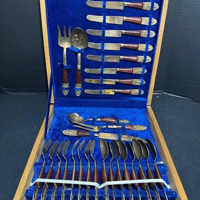 Set Of Brass Colored Flatware 