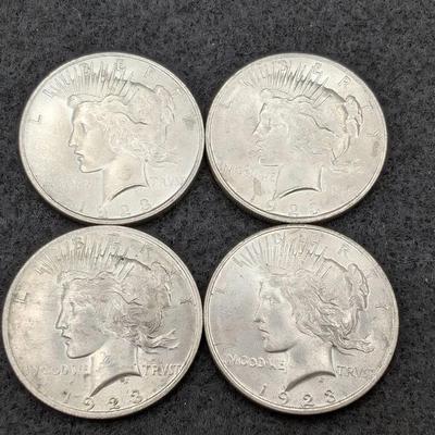 Four 1923 Peace Dollars